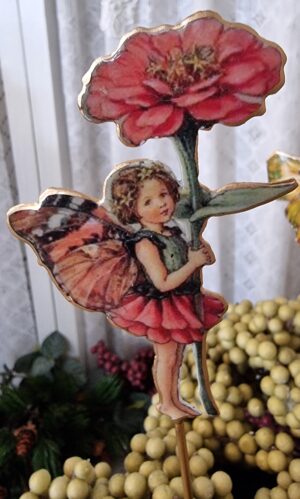 Gammaldags fe/älva på pinne röd